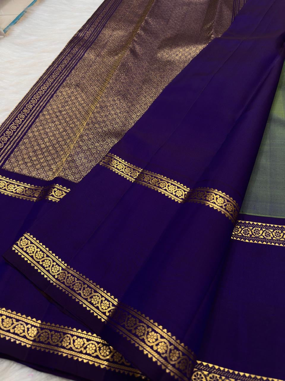 Green violet shot silk Kanjeevaram Rettapet saree with Kodi Malar creeper florals