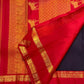 Deep violet and vermilion red Kanchipuram Rettapet saree with horse and peacock zari pallu