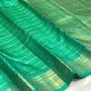 Jade green Kancheepuram saree with Vankipet, Malli Moggu and Benares Pet border