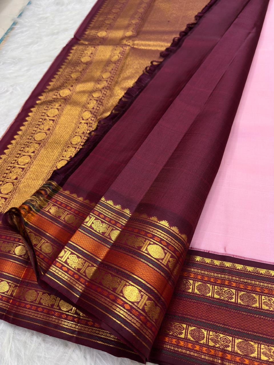 Deep Arakku border with Thazhampoo Reku and gold zari detailing