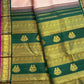 Detailed border view of petal pink Kanchipuram saree with traditional gold zari motifs