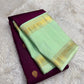 Magenta and Mint Green Handwoven Pure Silk Kanchipuram Saree with Rettapet Border and Mayil Chakram Butta