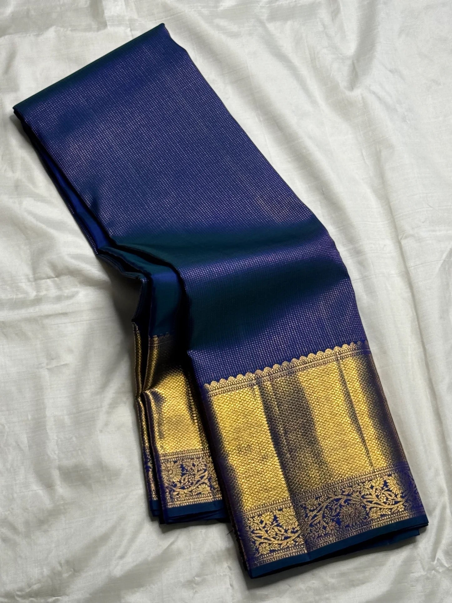 Navy blue handwoven pure silk Kanchipuram Zari Kattam saree with Kodi border — full overview