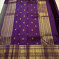 Olive green Kanchipuram saree body with scattered gold zari bird butta — close-up