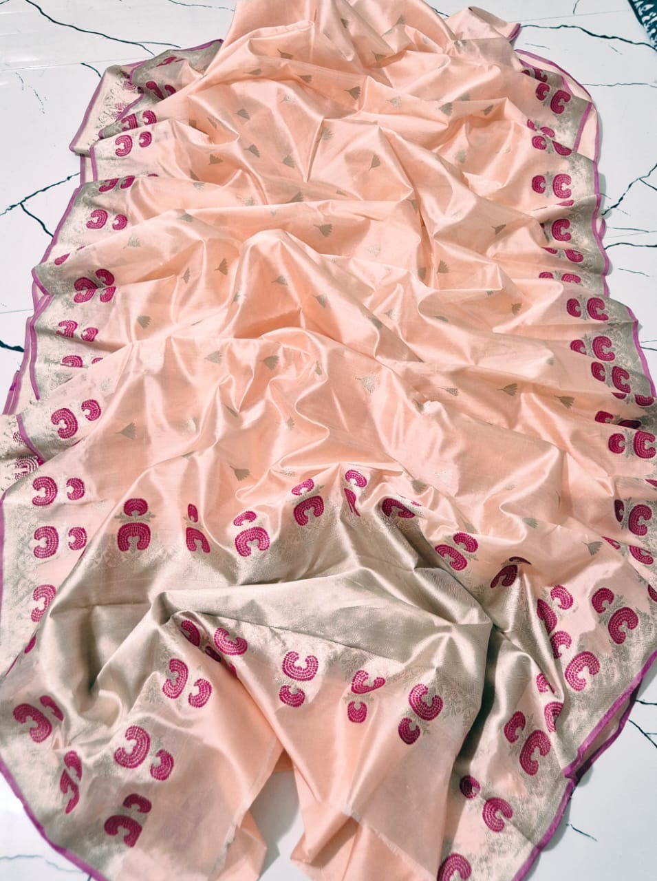 Full Peach Blush Pattu Silk Chanderi saree with magenta border, silver-toned detailing and metallic pallu
