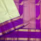 Gold zari Kamalam butta lotus medallion detail woven into pistachio green silk body of Kancheepuram saree