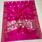 Folded Rani Pink Pattu Silk Chanderi saree with silver zari paisley buttas, green accents and tonal rose border