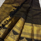 Pure Kanchipuram silk saree border closeup with wide gold zari border, black panel with gold woven motifs, shipped from New Jersey USA