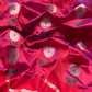 Full view of the Raspberry Red handloom Pattu Silk Chanderi saree with silver floral buttas and silver woven pallu