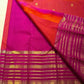 Magenta Kanchipuram pallu with richly layered gold zari band structure — full spread