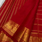 Deep red pallu with gold zari floral and temple motifs on Kanjivaram saree
