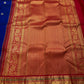 Royal blue and red handwoven pure silk Kanchipuram butta saree with Kamalam motifs and elaborate zari border — full overview