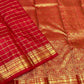 Kodi Malar floral climber pallu on a vermilion Kanjipuram silk saree
