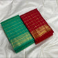 Jade green Kanjivaram silk saree with buttas at alternate intersections