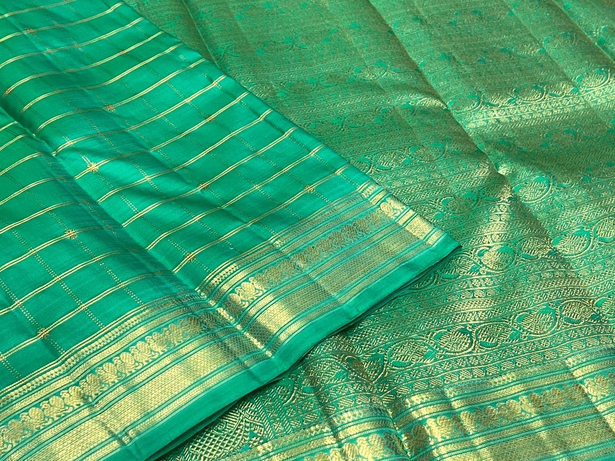 Jade green Kanjipuram Zari Kattam saree with double Muthu Seer
