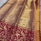 Crimson Kanchipuram border with large peacock and floral gold zari motifs