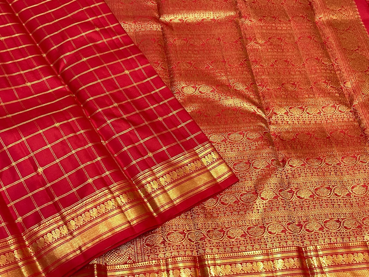 Vermilion Kancheepuram saree with Vankipet, Malli Moggu and Benares Pet border