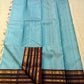 Sky blue and maroon Kanchipuram silk saree folded flat — full length view