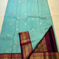 Sky blue and maroon handwoven pure silk Kanchipuram butta saree with Kamalam motifs and grand zari border — full overview