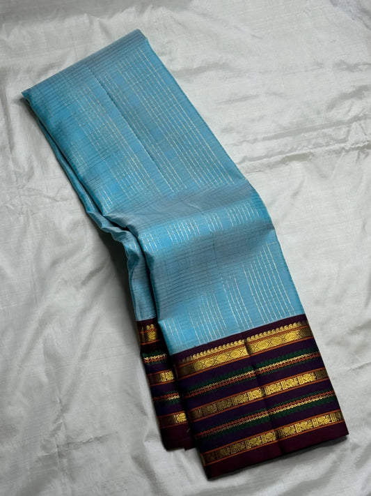 Sky blue and maroon handwoven pure silk Kanchipuram saree with Varisaipet border — full overview