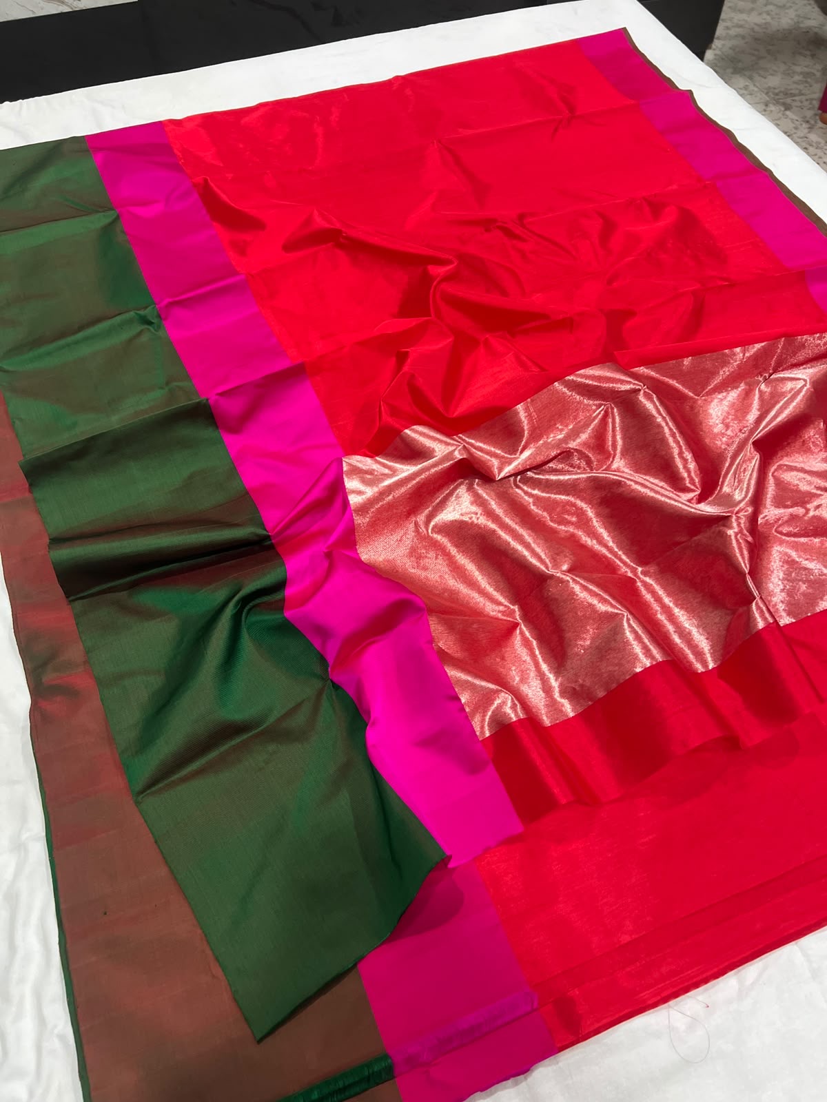 Full length view of Vermilion Red Pattu Silk Chanderi saree with Rani Pink and Emerald Green Mashru border