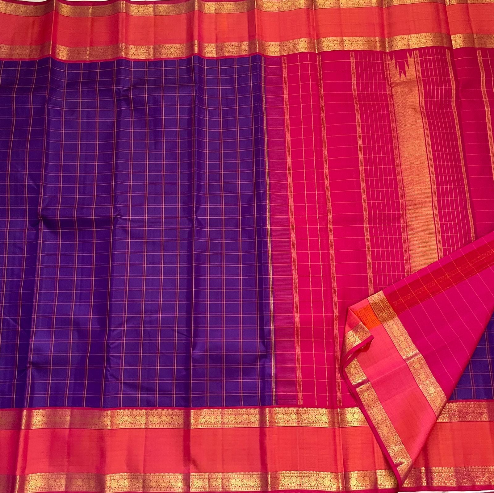 Coral red pallu with gold zari temple motifs on Rettapet Kanchi Kattam Kanjivaram saree