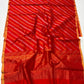 Draped Vermilion Red handloom Chanderi silk saree showing gold-toned pallu
