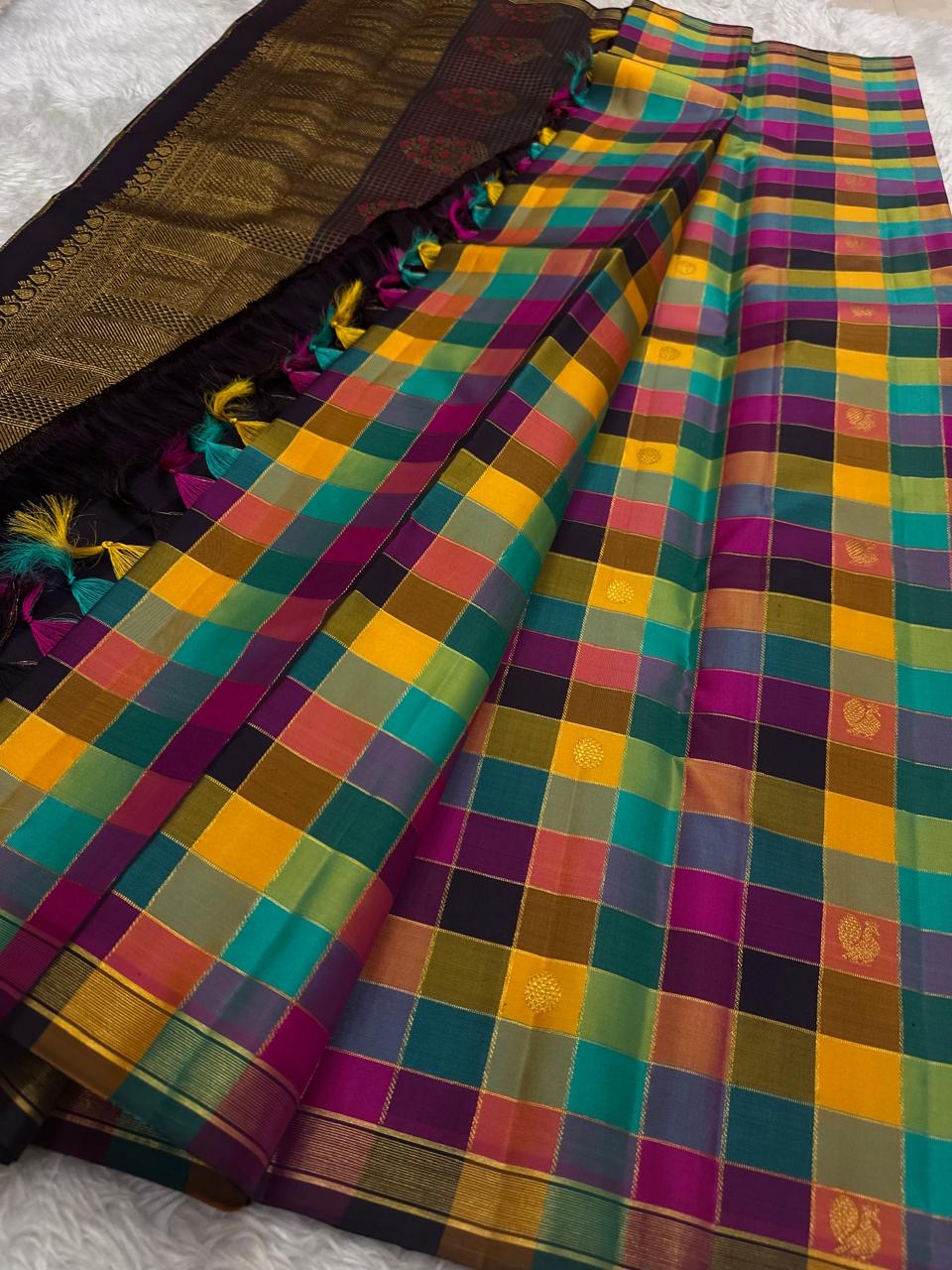 Traditional Kanchipuram silk saree with vibrant multicolour checked pattern and zari motifs