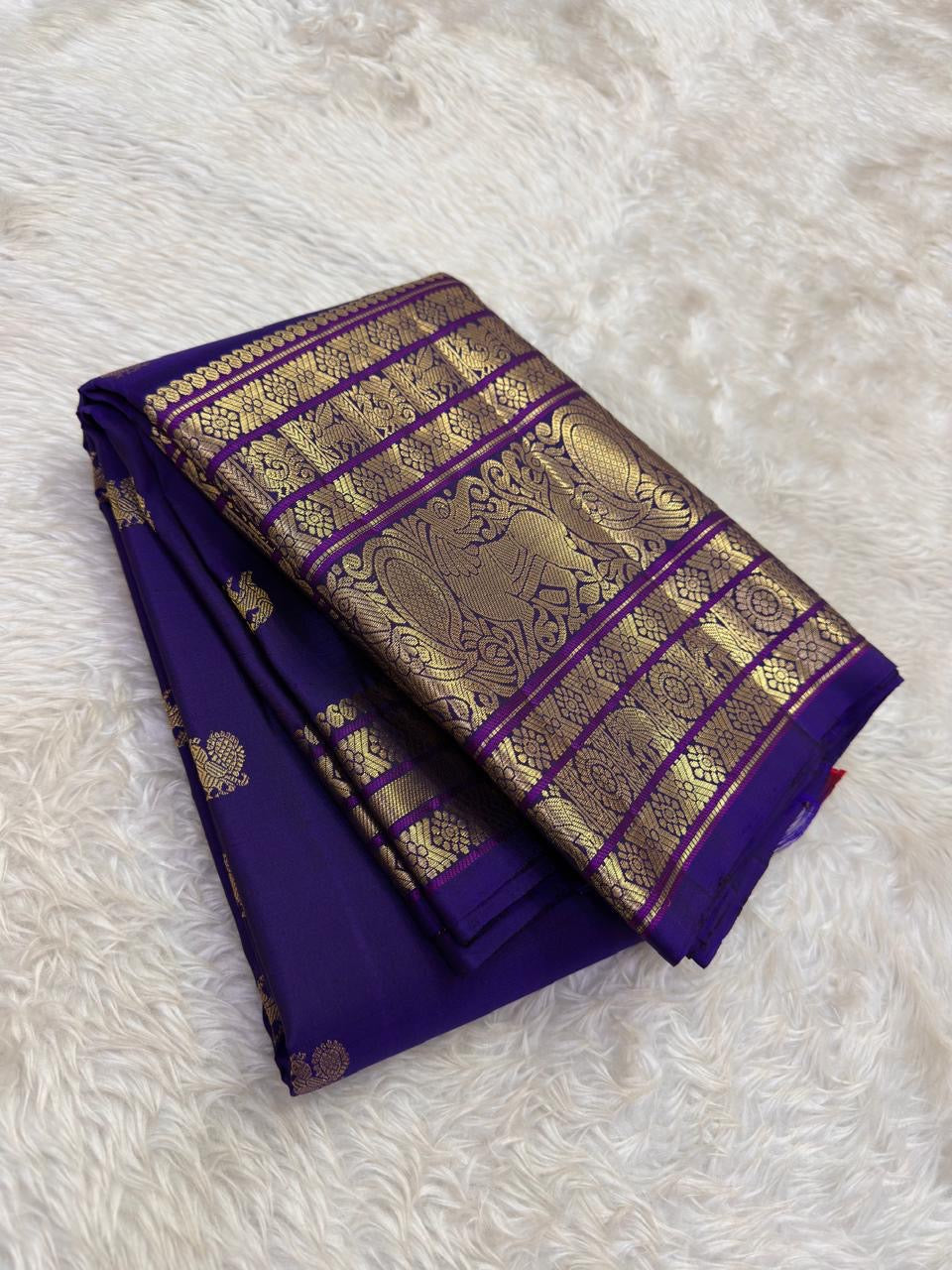 Royal violet Pure Silk Kanjivaram Korvai saree with antique gold Gandaberunda zari border detailing