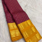 Handwoven pure silk Kanchipuram zari kattam saree in plum purple with manjal yellow contrast and tiny gold buttas.