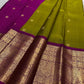 Pure silk Kanchivaram Butta saree with vibrant rani magenta border and antique gold Yazhi zari panels