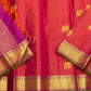 Detailed purple pallu weave pattern with gold zari border and green edge next to rani pink vairaoosi body