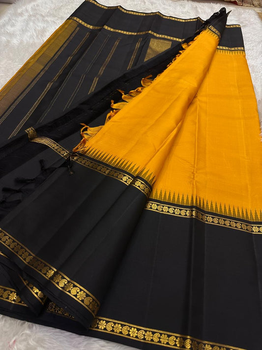 Amber yellow and black Kanchipuram silk saree with Rettapet weave and Veldhari Korvai border — Idam Living