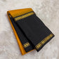 Amber yellow pure silk Kanjipuram saree with black Korvai border and gold zari flower motifs — Idam Living