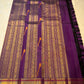 Amethyst purple Kanjivaram silk saree with orange red korvai pallu and zari border