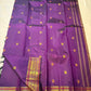 Amethyst purple pure silk Kanchipuram saree with radiant orange red korvai pallu – full drape view