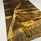 Handloom Antique Gold Chanderi saree draped to show luminous tissue silk, small buttas and dark olive border