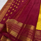 Deep magenta border detail on antique gold Kanjipuram Korvai silk saree