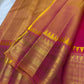 Rani pink Kanjeevaram silk saree antique gold border close-up detail