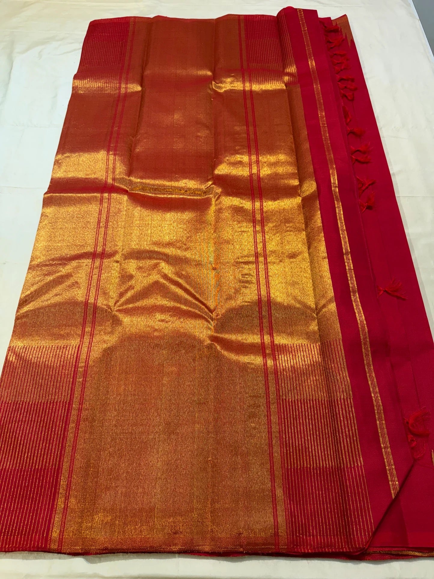 Crimson red Kanjipuram silk saree body with ettukol flame border detail — Idam Living