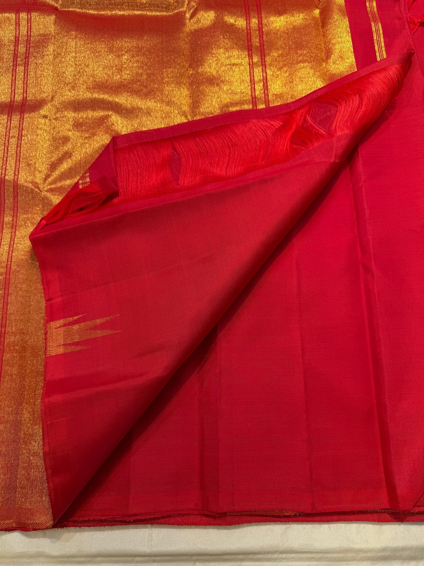Ettukol flame motifs in gold zari rising on crimson red Kanchipuram pure silk saree — Idam Living