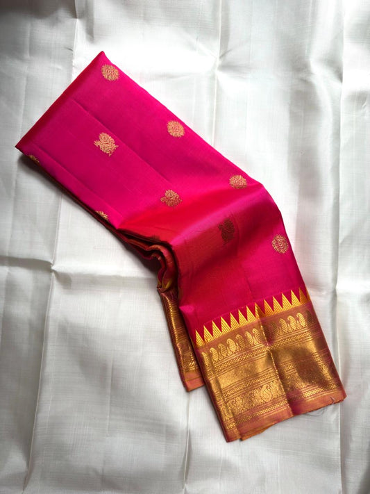 Rani pink handwoven pure silk Kanjeevaram saree with antique gold Zari Kattam border