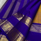 Royal blue floral border on antique gold Kanjivaram silk saree