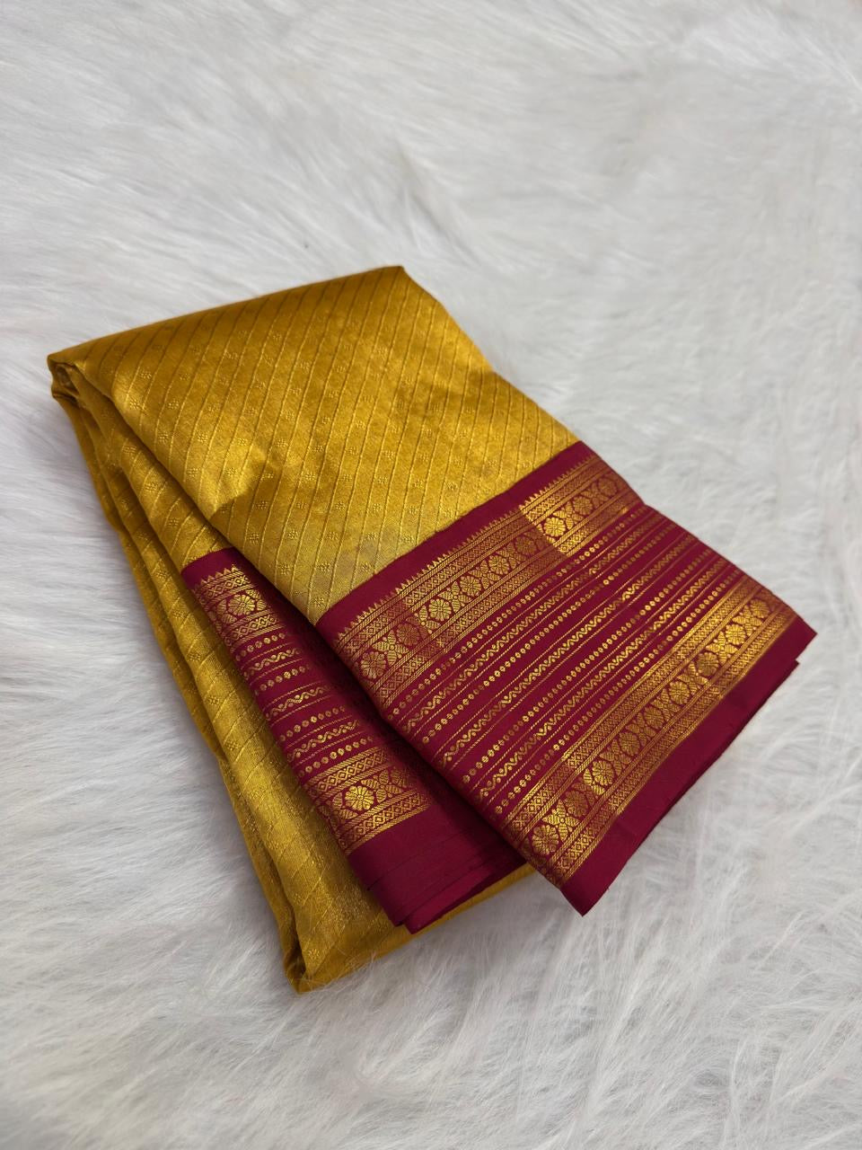 Antique gold Kanjipuram silk saree with deep magenta Korvai border, alternate view