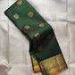 Broad Antique Gold zari Kanchi Pattu border with large peacock-inspired ornamental forms.