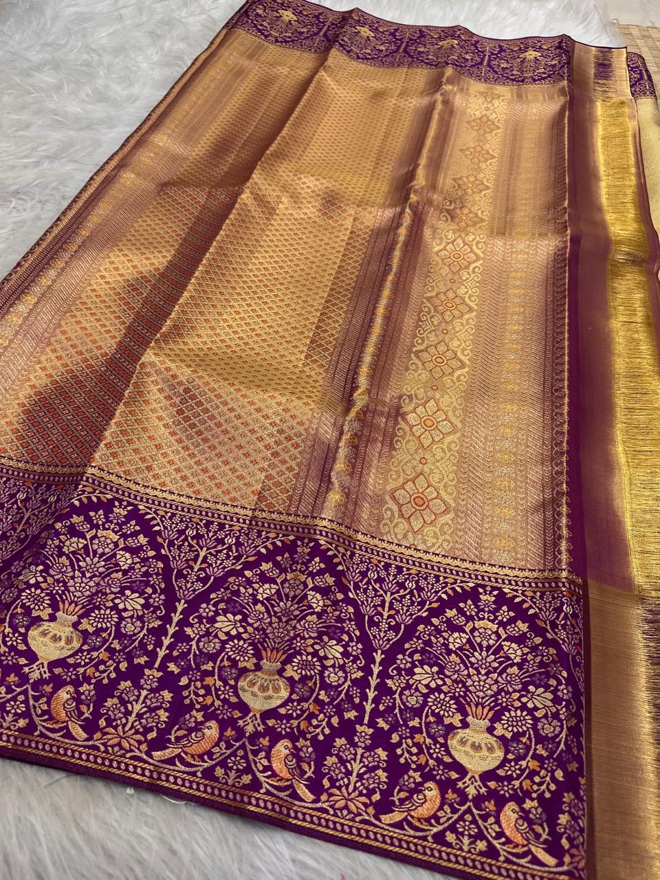 Close view of Kanchana Purple floral jaal zari border on a handwoven Antique Gold Kanchipuram saree.