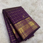 Antique gold on a purple Kanchipuram silk saree, Idam Living