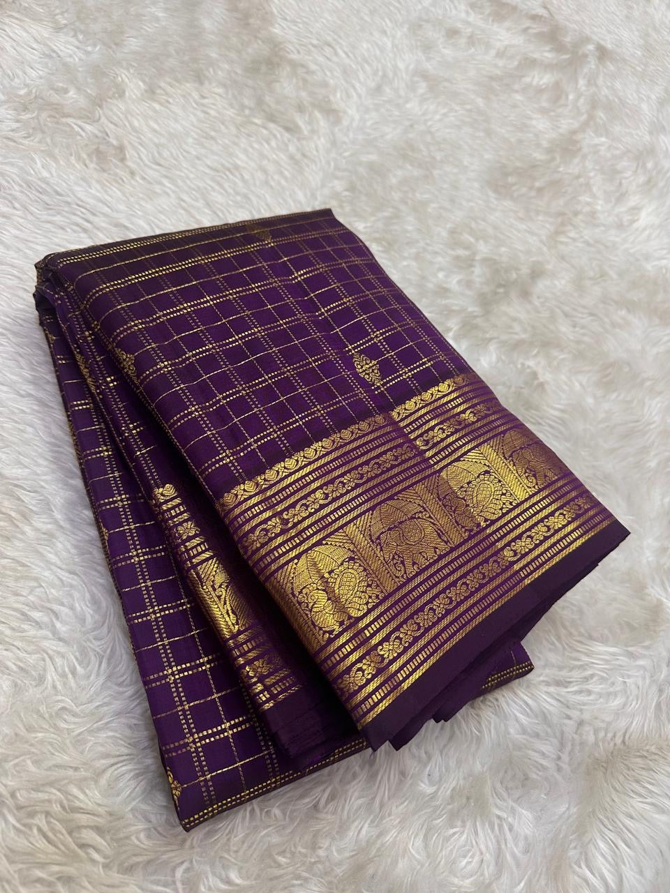 Antique gold on a purple Kanchipuram silk saree, Idam Living