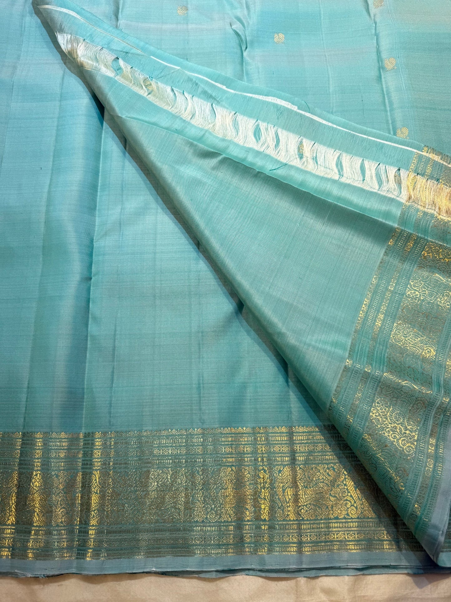 Sea Glass Aqua Handwoven Pure Silk Kanchi Pattu Saree with Antique Gold Zari Buttas and Ornamental Border
