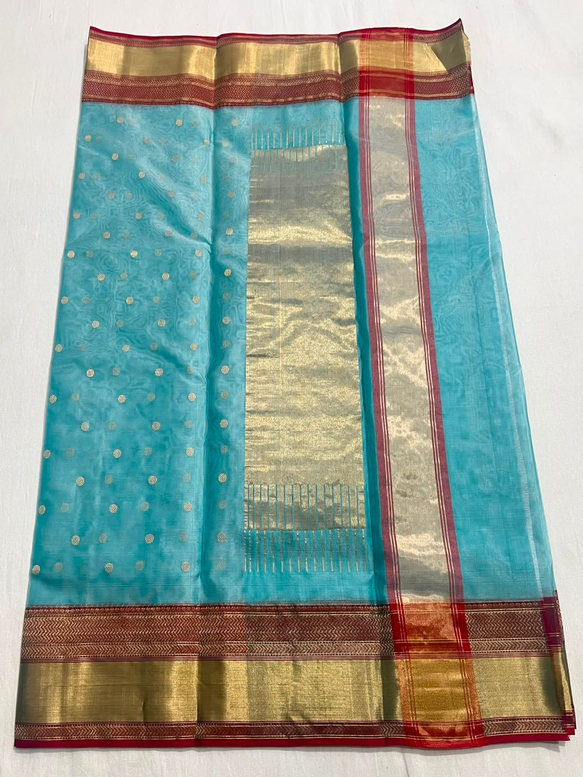 Blue Chanderi silk with small scattered gold-toned accents